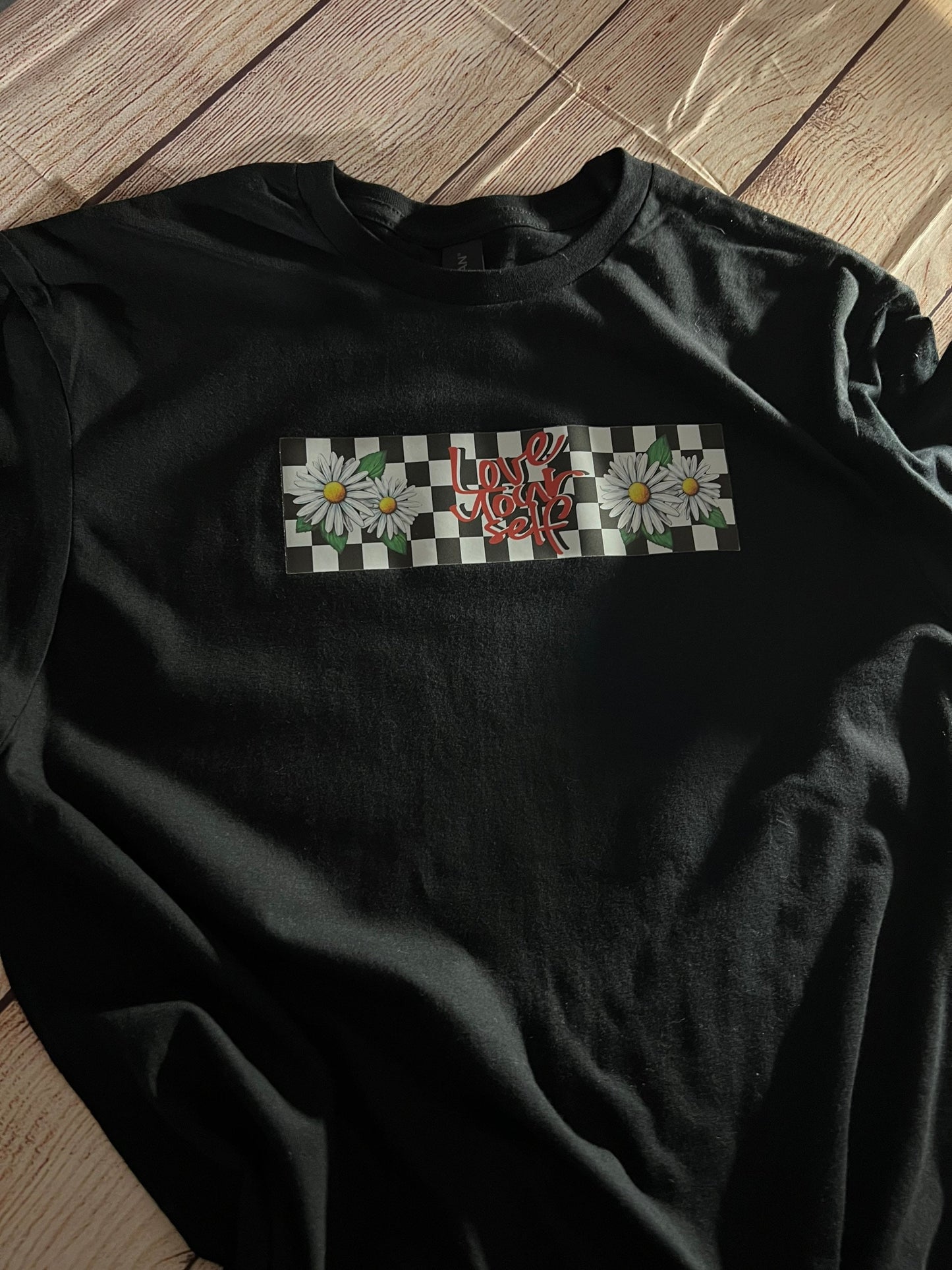 Love Yourself Daisy Checkered T-shirt.