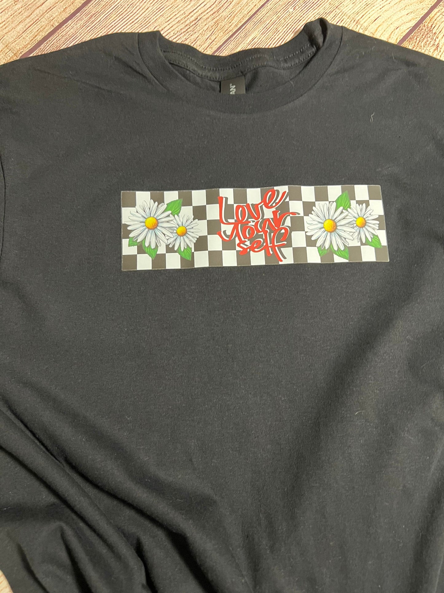 Love Yourself Daisy Checkered T-shirt.