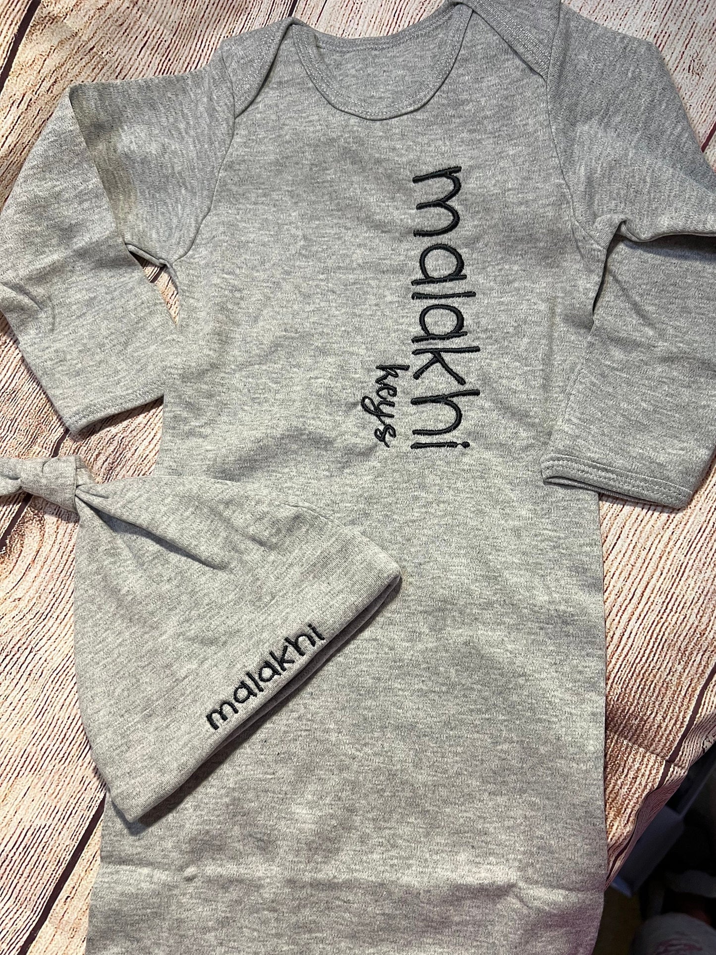 Baby gown w/ baby’s name on side and hat