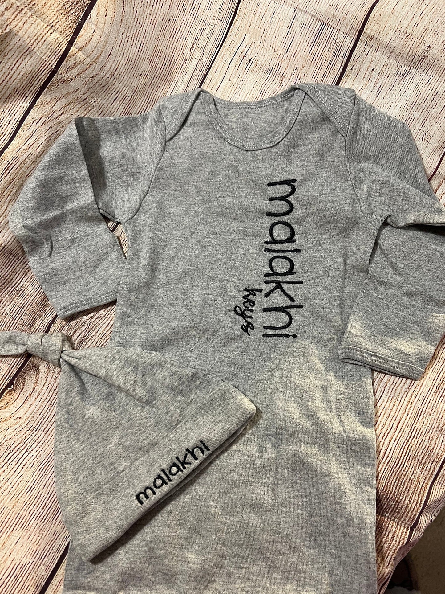 Baby gown w/ baby’s name on side and hat