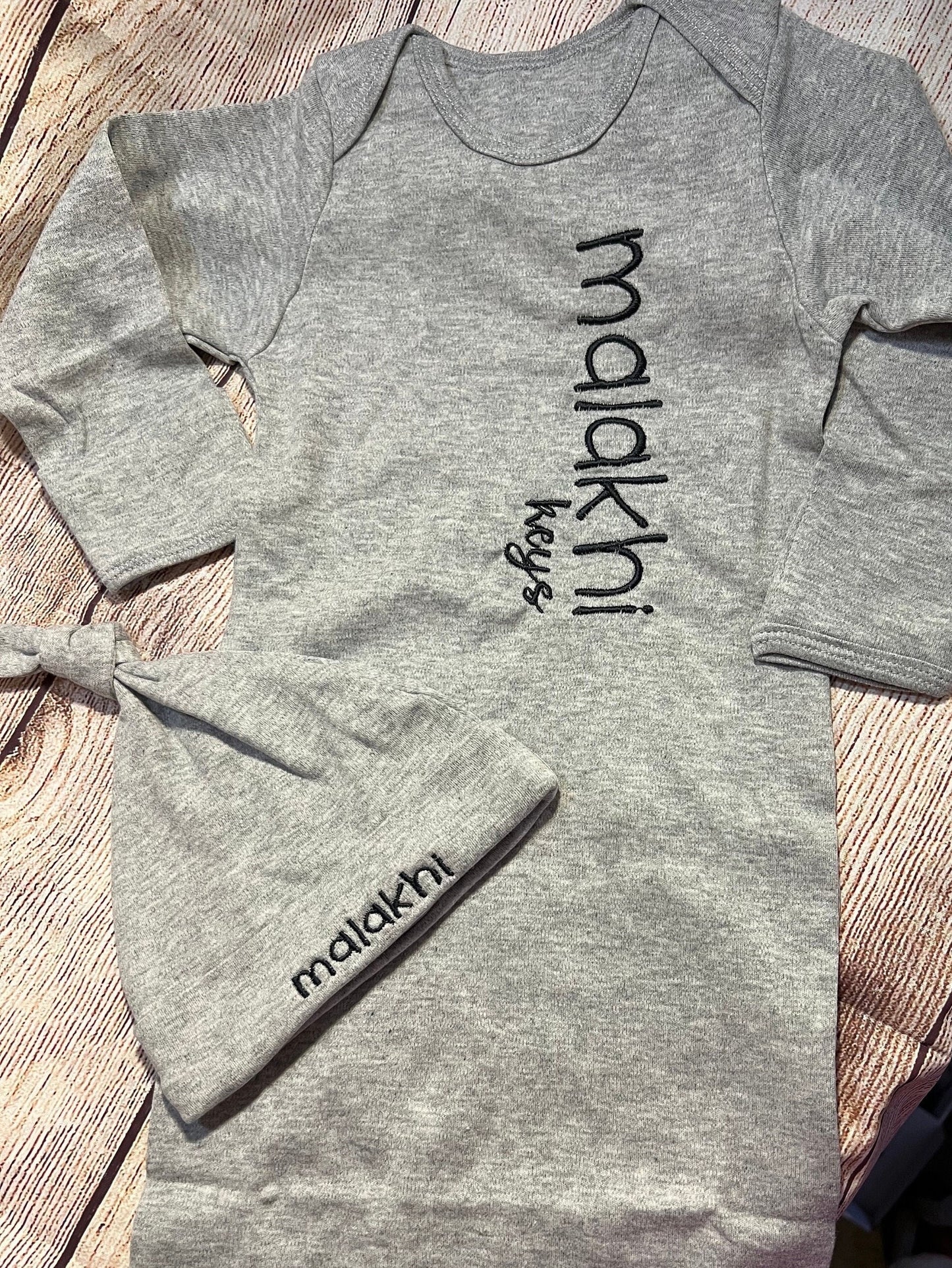 Baby gown w/ baby’s name on side and hat